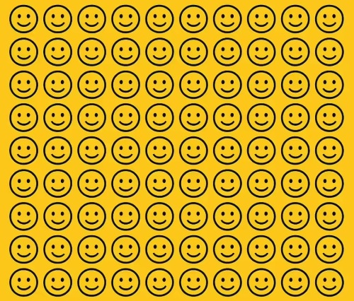 Σπαζοκεφαλιά, περίεργο χαμογελαστό emoji